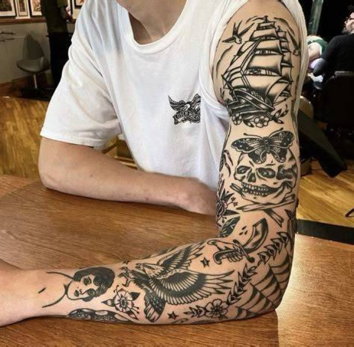 25 Best Blackwork Tattoos For Men in 2024
